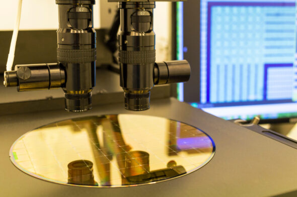 Silicon,Wafer,On,Machine,Process,Examining,In,Microscope.